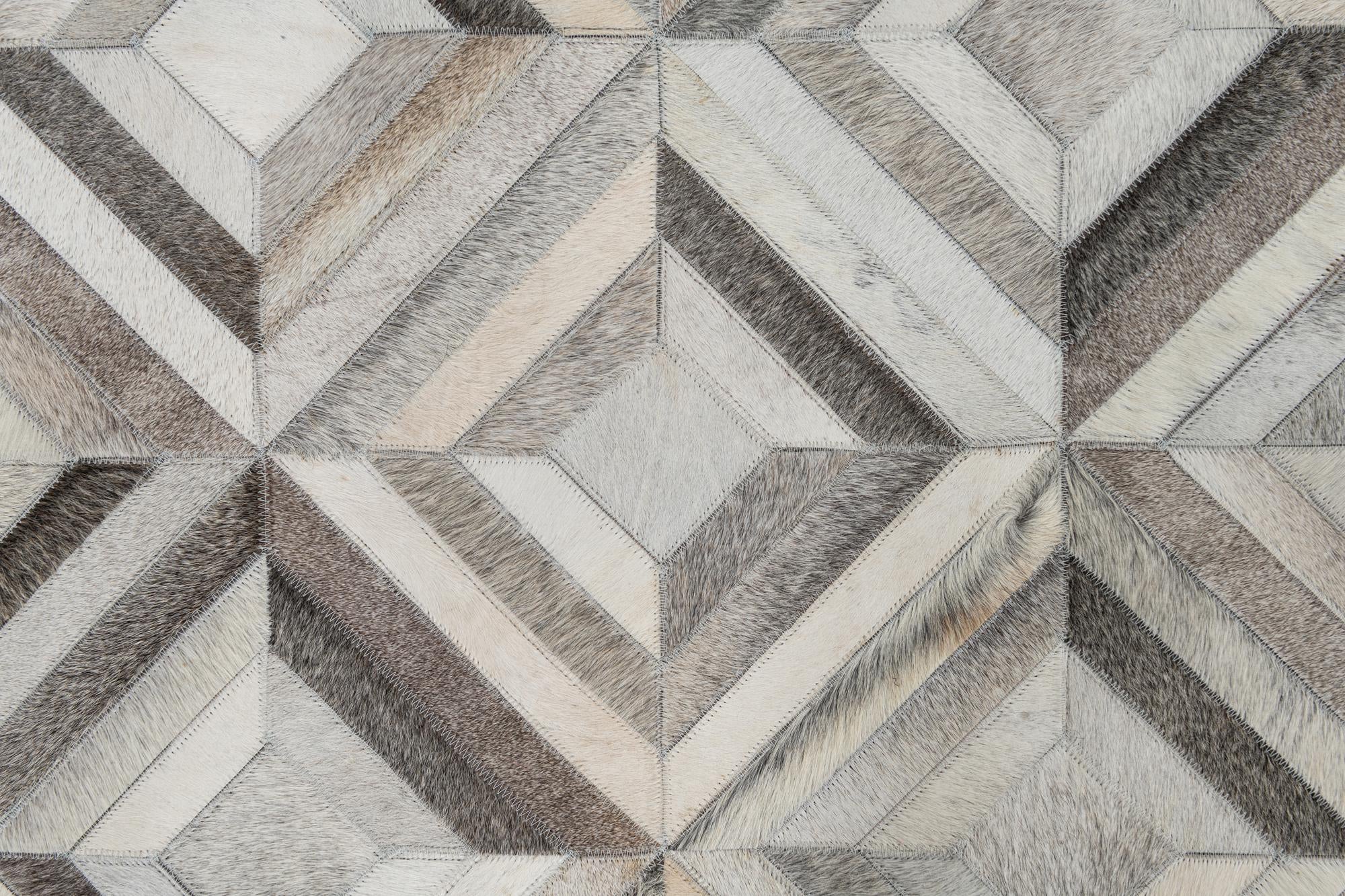 4' 7 x 7' 1 Cowhide Leather Rug