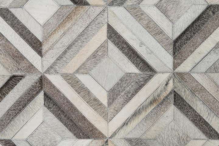 4' 7 x 7' 1 Cowhide Leather Rug