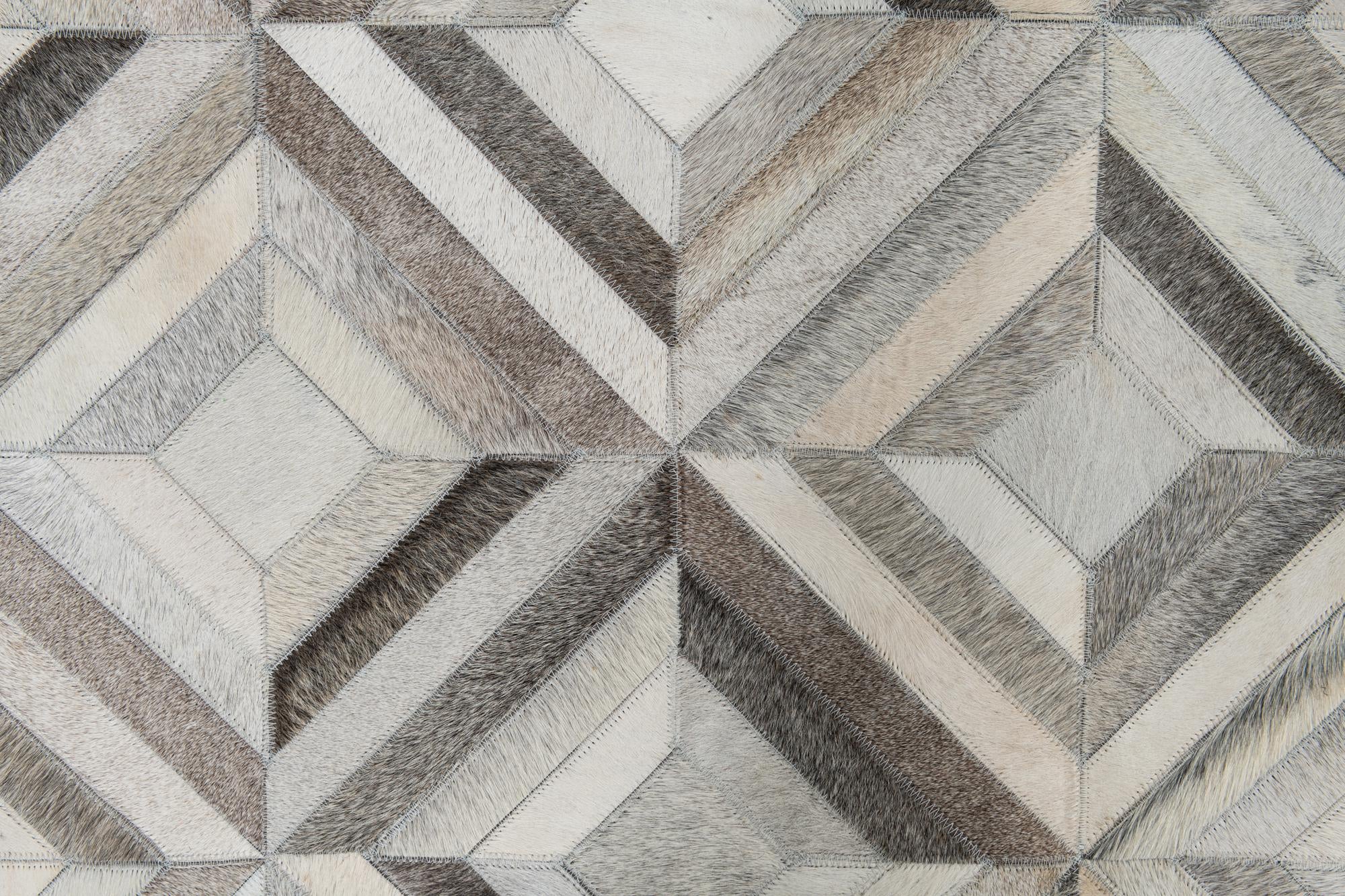 4' 7 x 7' 1 Cowhide Leather Rug