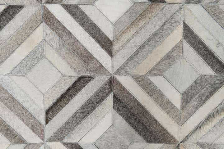 4' 7 x 7' 1 Cowhide Leather Rug