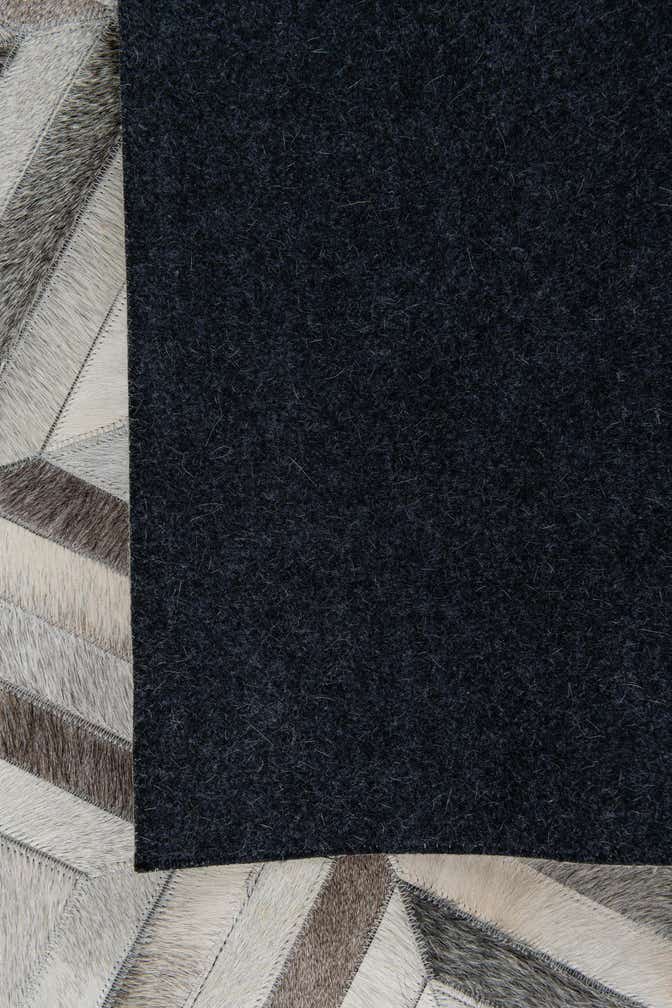 4' 7 x 7' 1 Cowhide Leather Rug