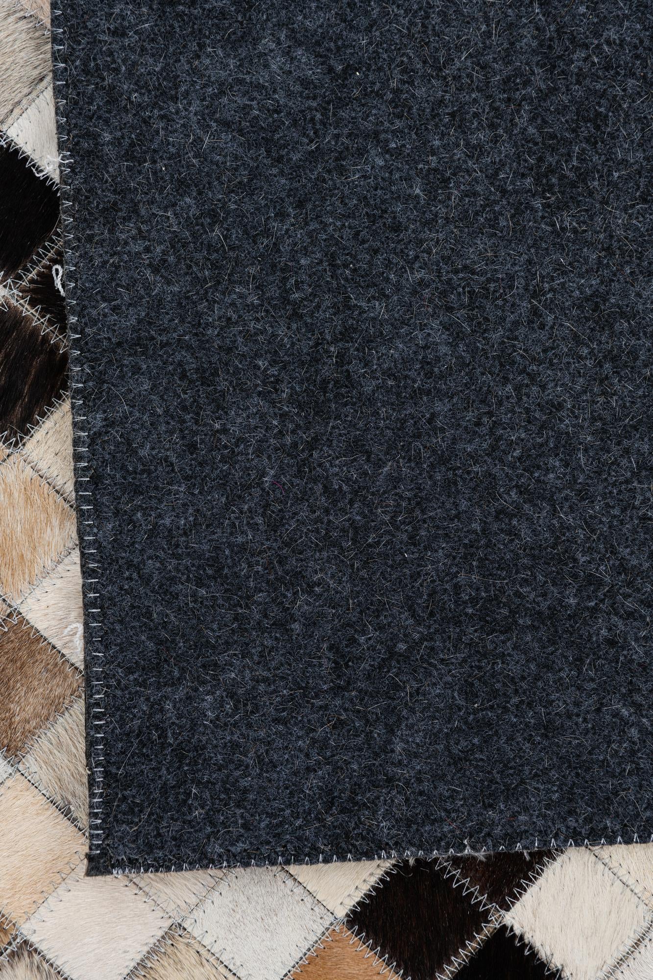 8' 1 x 9' 10 Cowhide Leather Rug