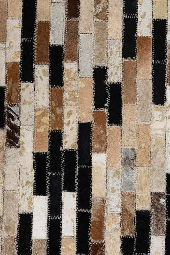 8' 1 x 9' 10 Cowhide Leather Rug