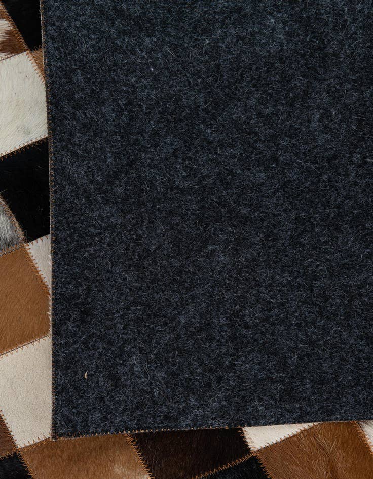 Detail image of 5' 1 x 8' Cowhide Leather Rug