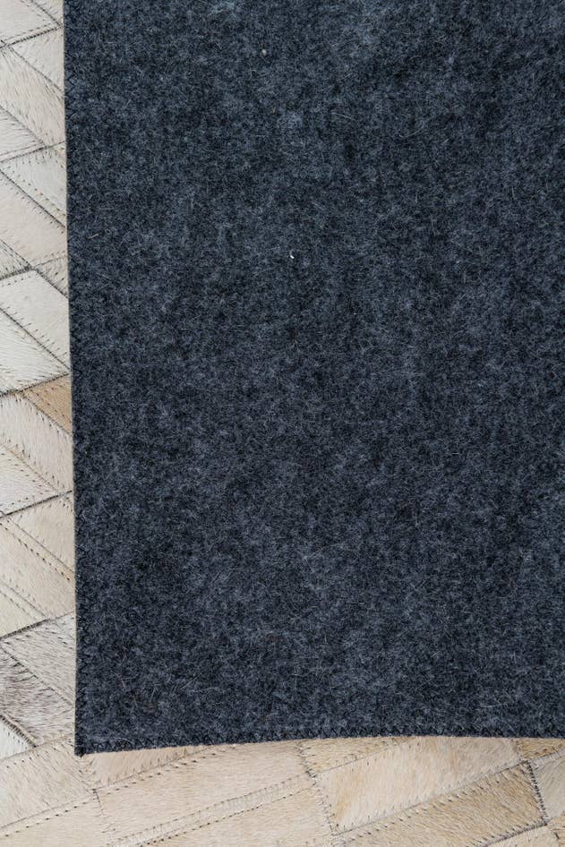 Detail image of 5' 1 x 8' Cowhide Leather Rug