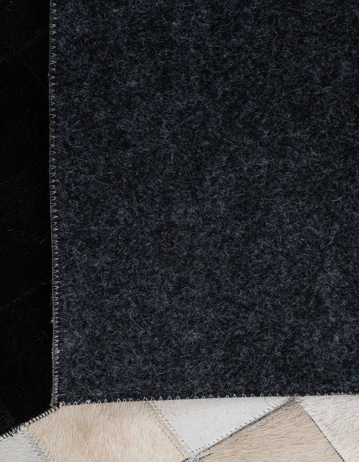 Detail image of 5' 1 x 8' Cowhide Leather Rug