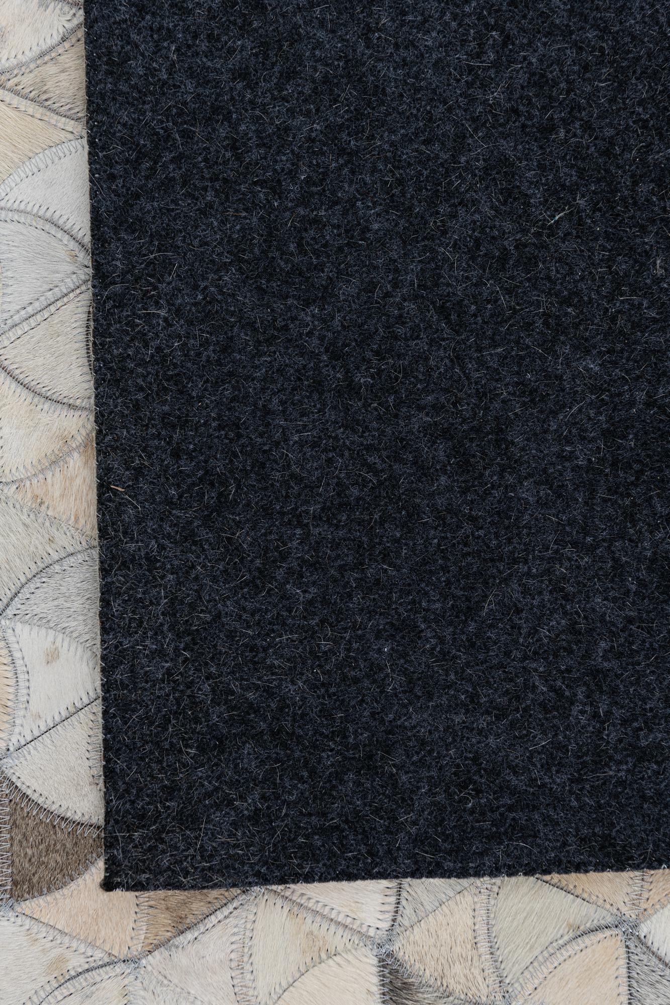 5' 2 x 8' 1 Cowhide Leather Rug