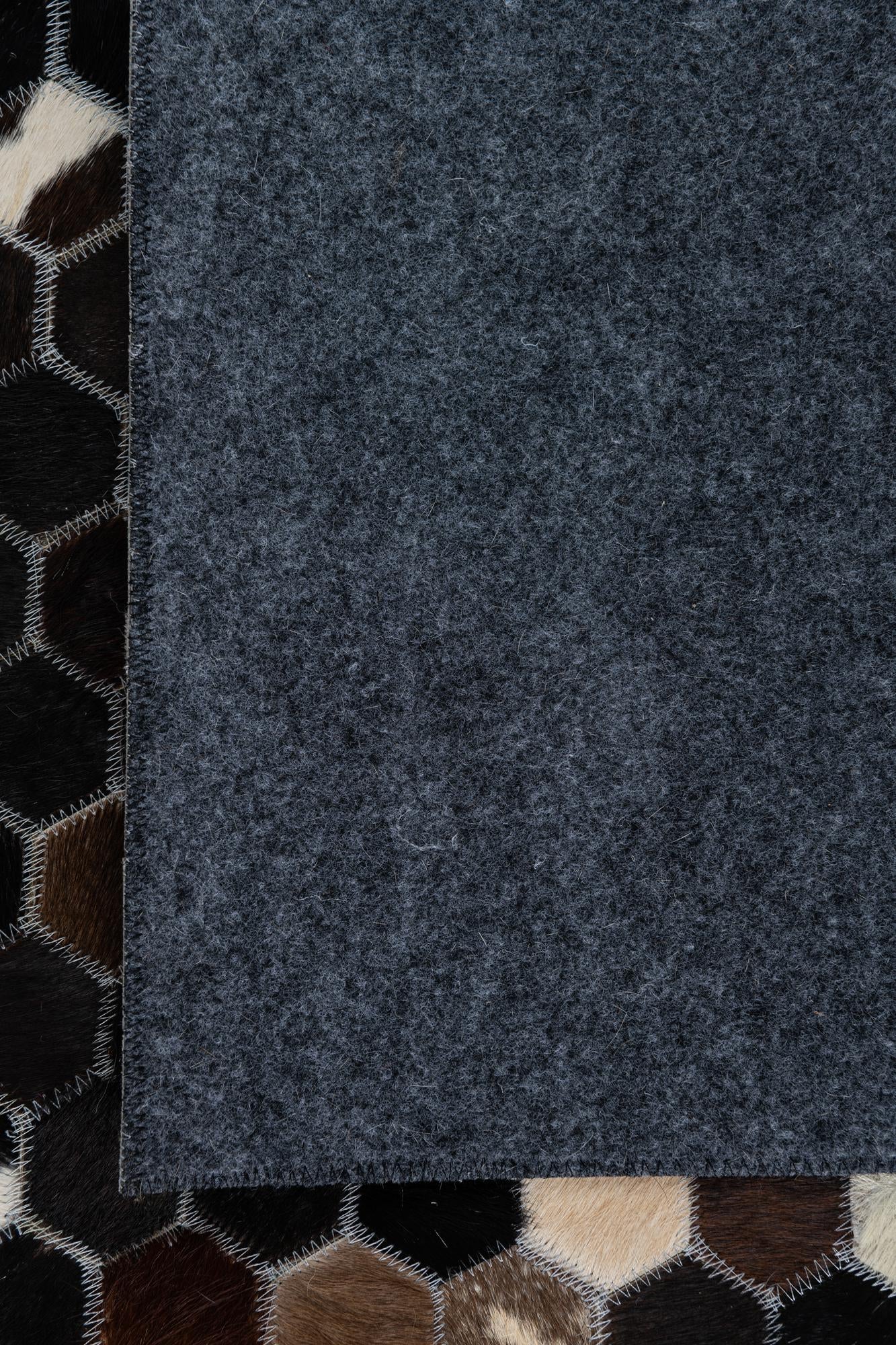 5' 1 x 7' 10 Cowhide Leather Rug