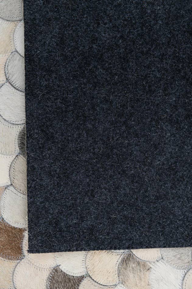 Detail image of 5' 1 x 8' Cowhide Leather Rug