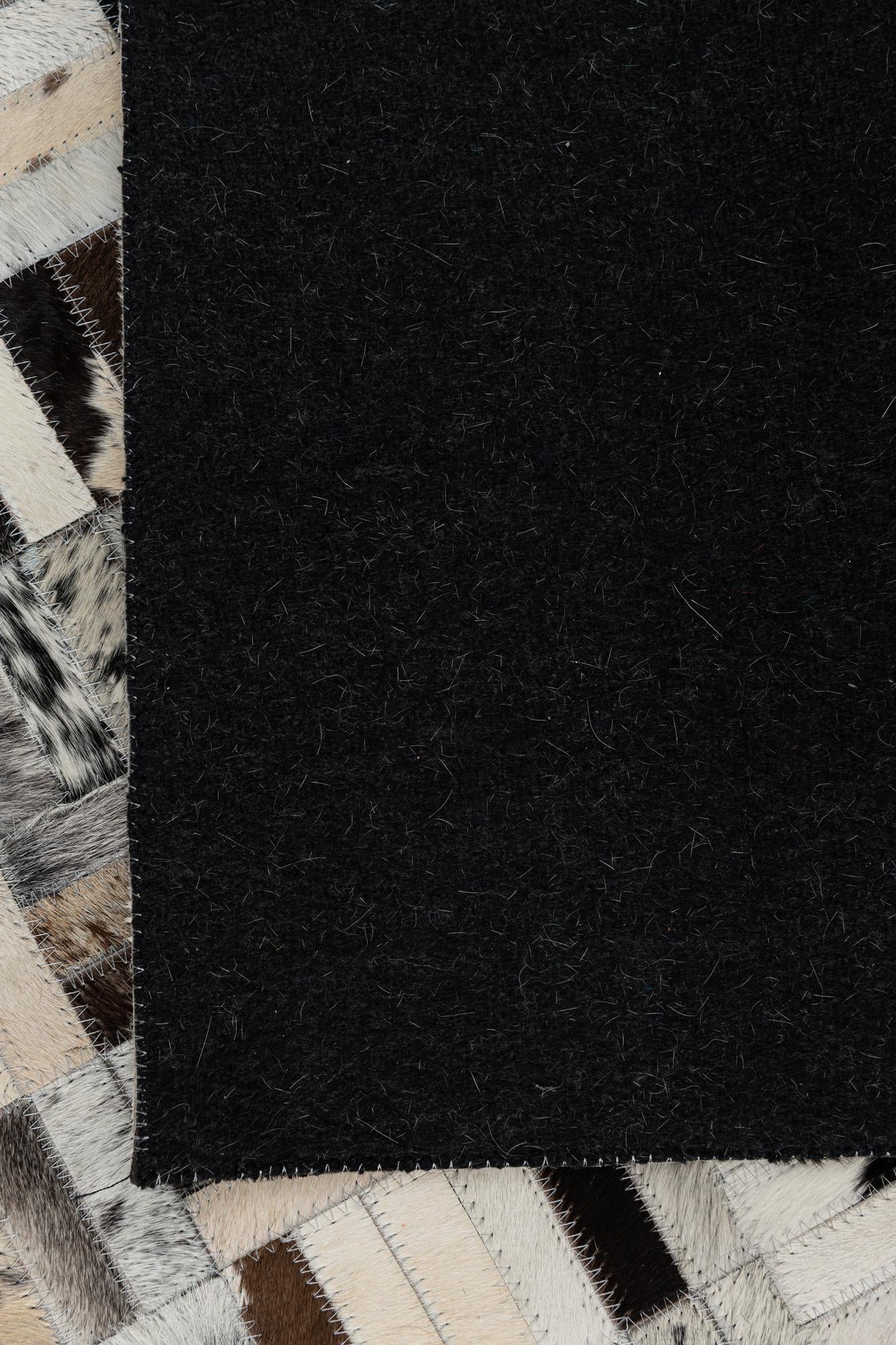 5' x 7' 9 Cowhide Leather Rug