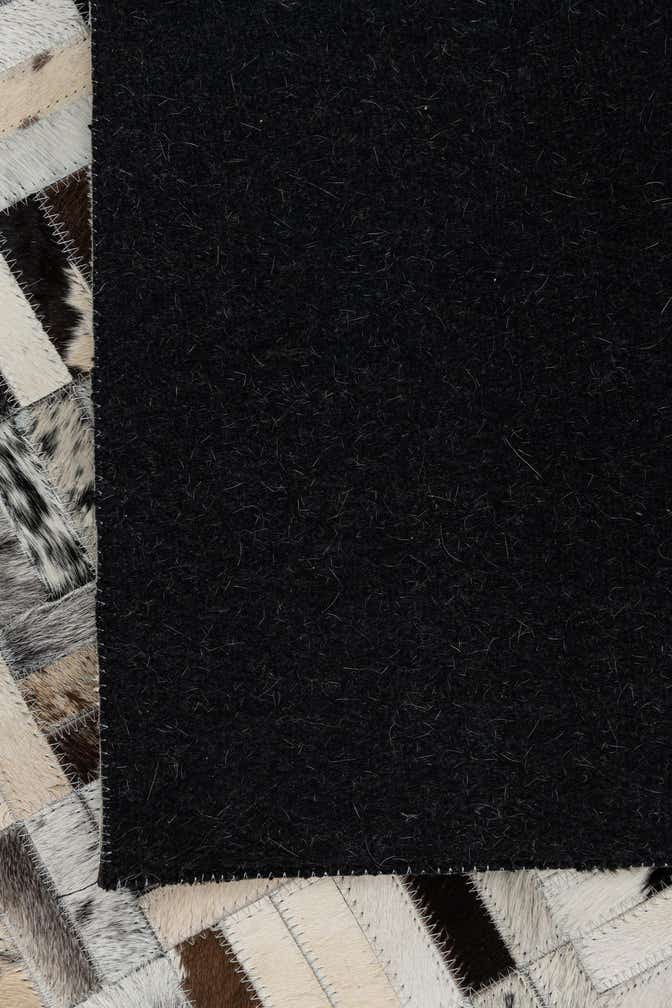 5' x 7' 9 Cowhide Leather Rug