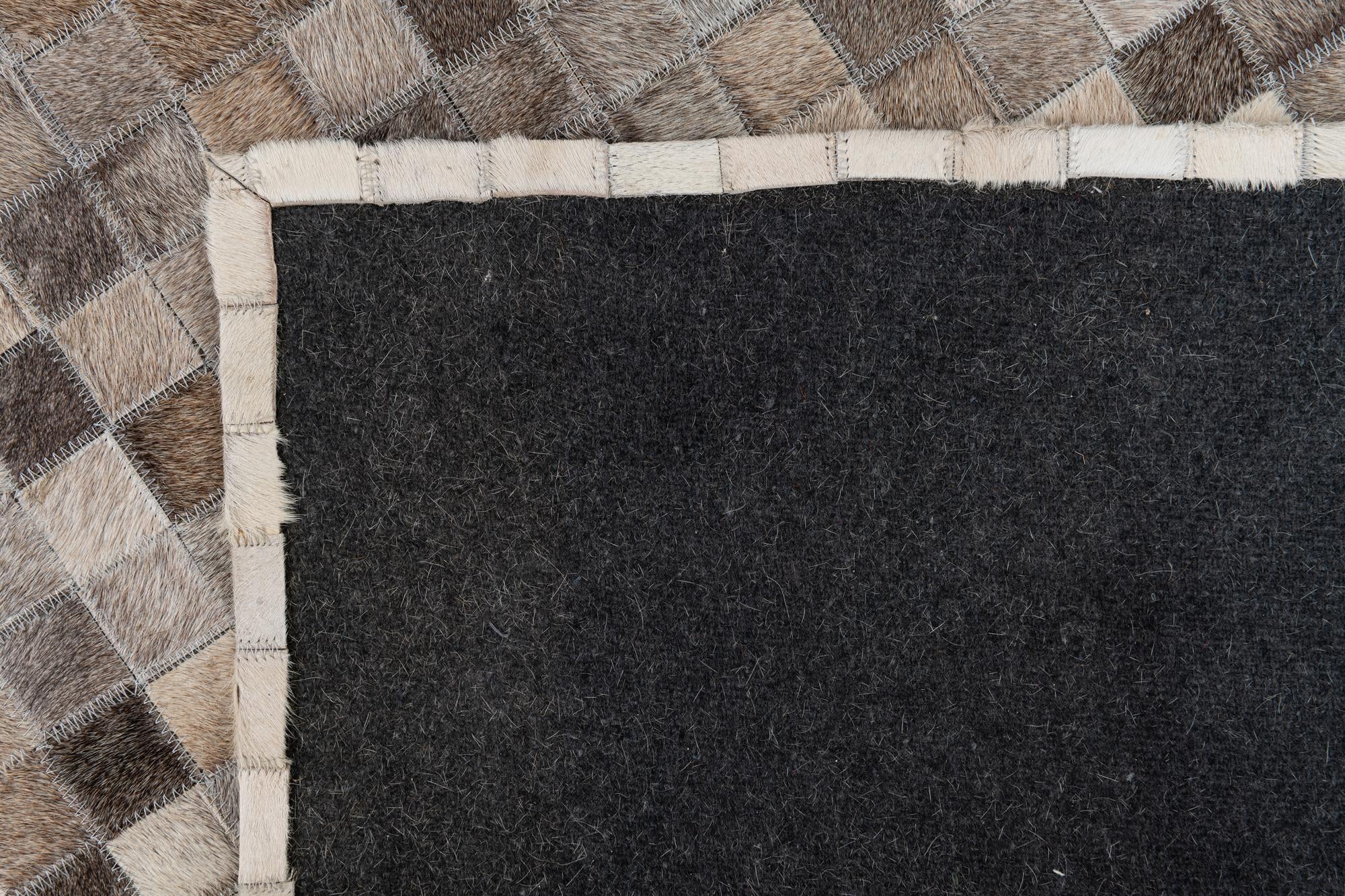 5' 3 x 7' 8 Cowhide Leather Rug