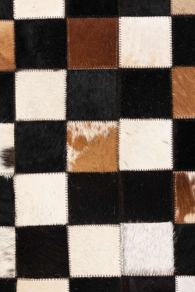 5' 1 x 8' 1 Cowhide Leather Rug