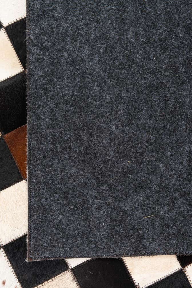5' 1 x 8' 1 Cowhide Leather Rug