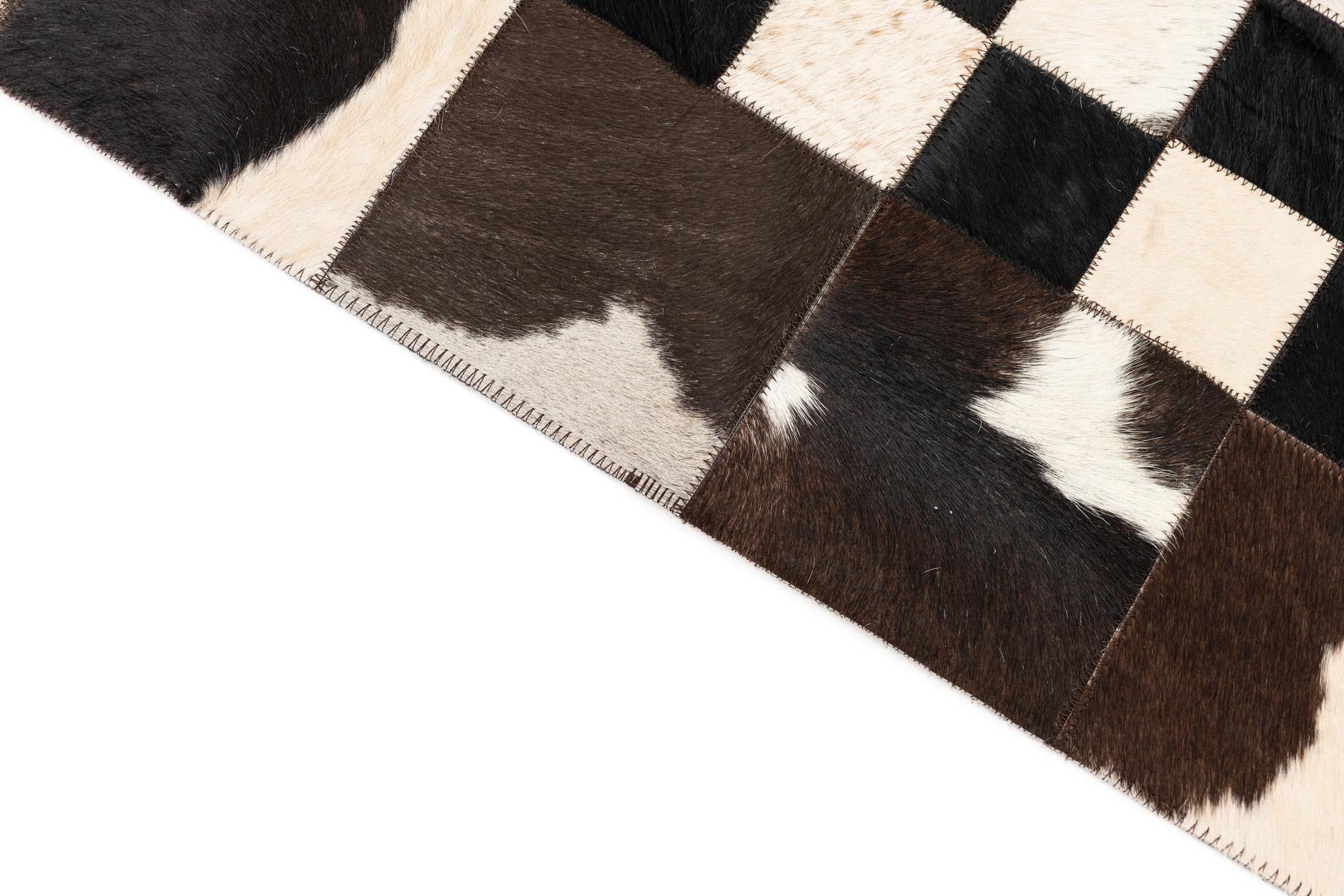 5' 1 x 8' 1 Cowhide Leather Rug