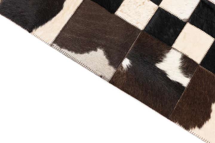 5' 1 x 8' 1 Cowhide Leather Rug