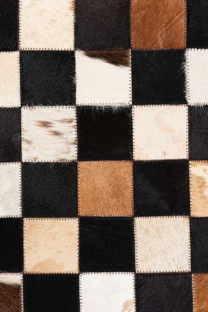 5' 1 x 8' 1 Cowhide Leather Rug