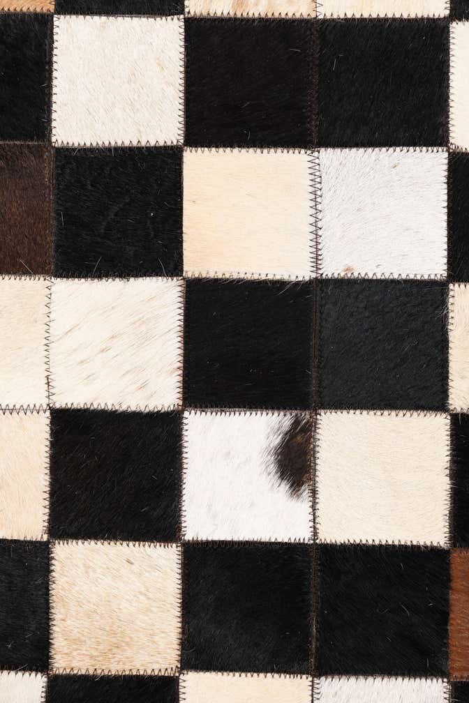 5' 1 x 8' 1 Cowhide Leather Rug