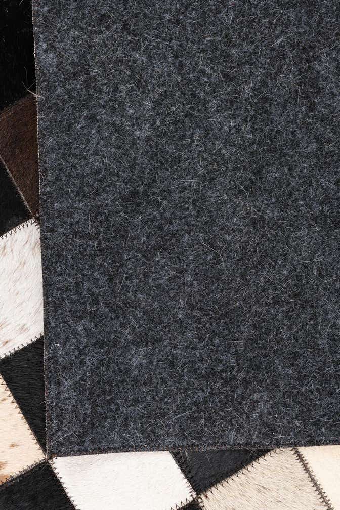 5' 1 x 8' 1 Cowhide Leather Rug