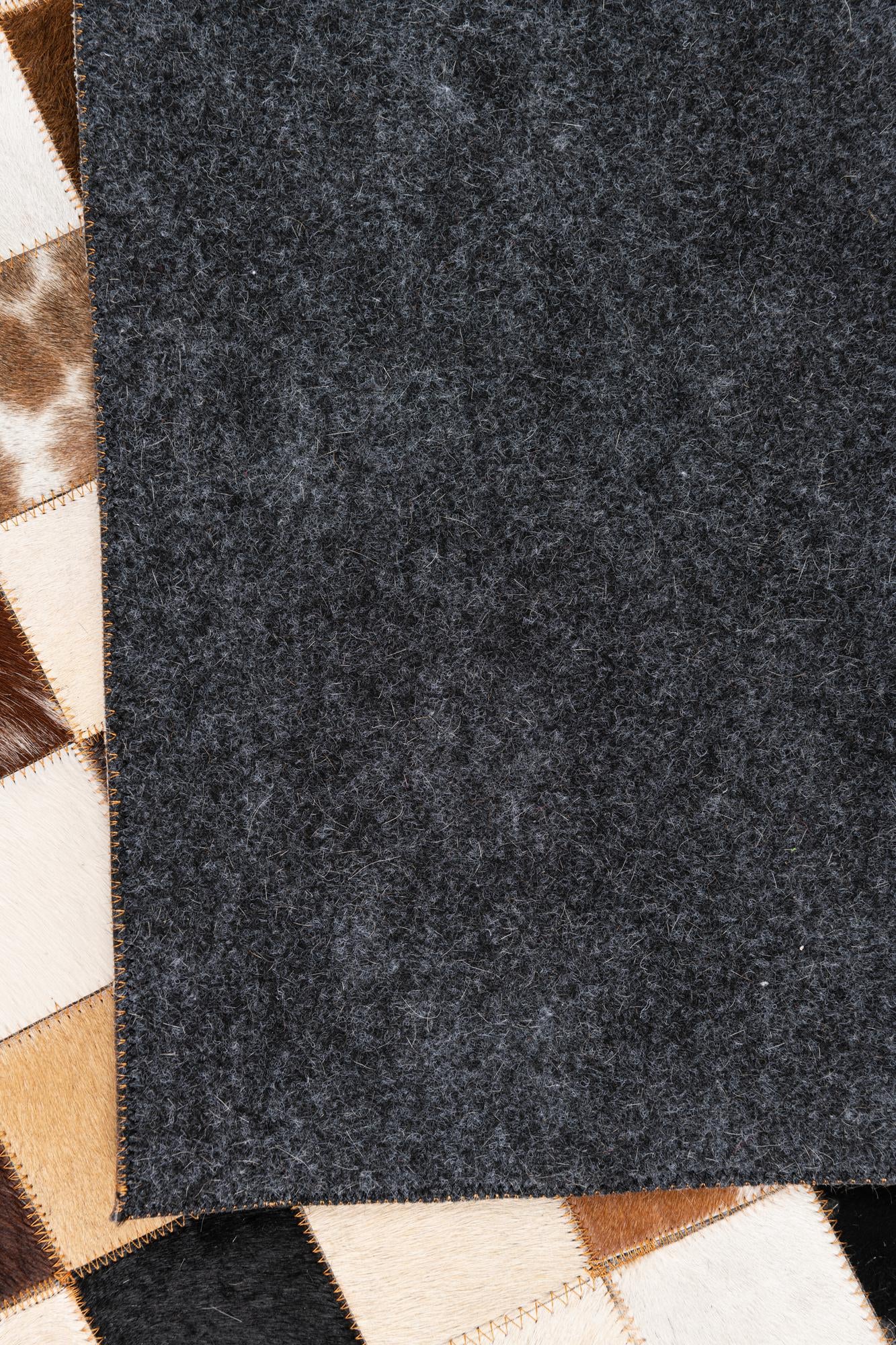 5' 1 x 8' 1 Cowhide Leather Rug