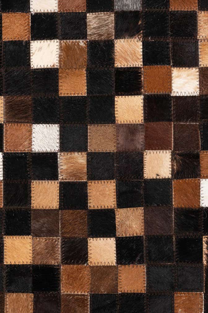 5' 1 x 7' 10 Cowhide Leather Rug