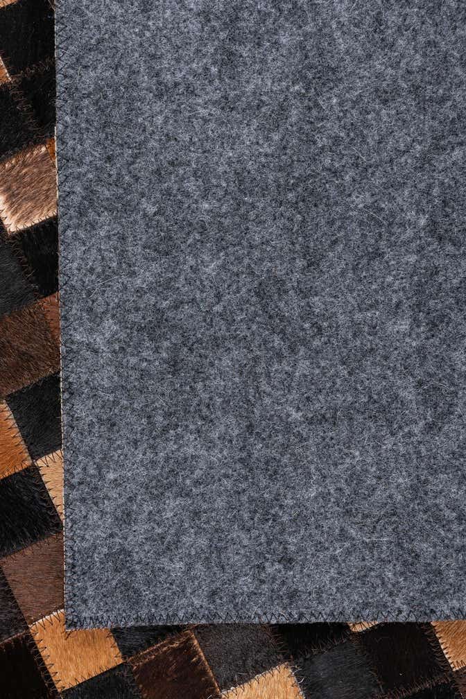 5' 1 x 7' 10 Cowhide Leather Rug