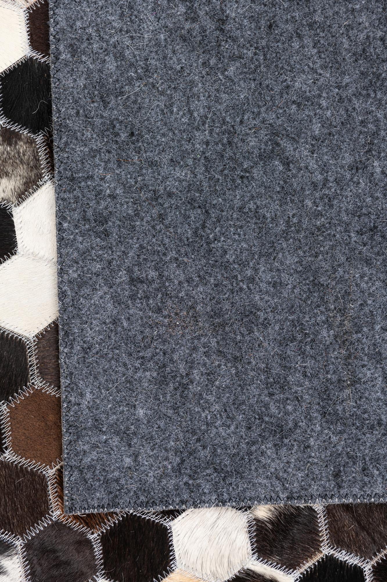5' 1 x 7' 9 Cowhide Leather Rug