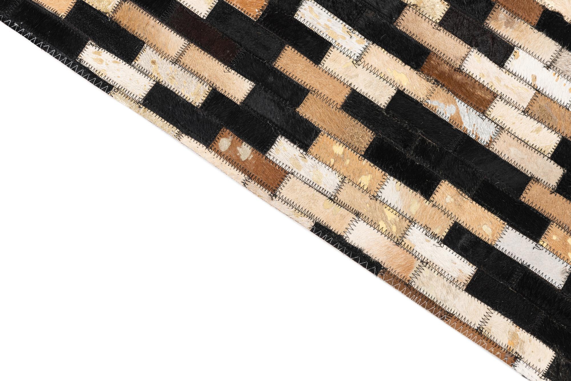 5' x 7' 9 Cowhide Leather Rug
