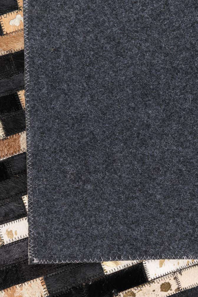 5' x 7' 9 Cowhide Leather Rug