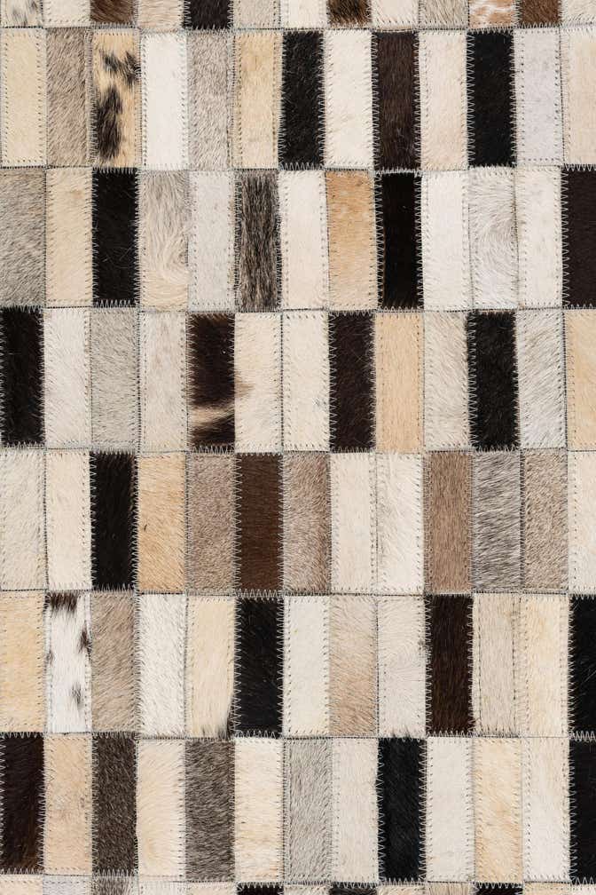 5' x 7' 9 Cowhide Leather Rug