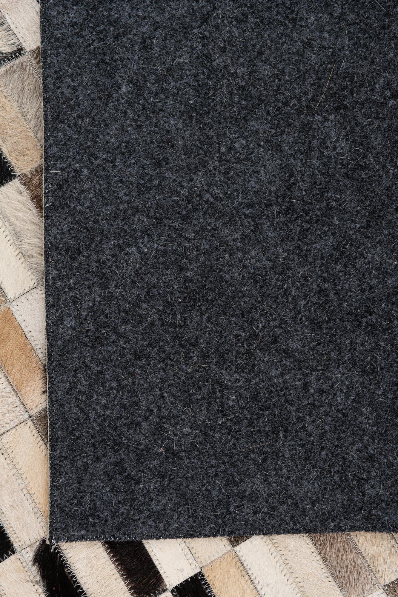 5' x 7' 9 Cowhide Leather Rug
