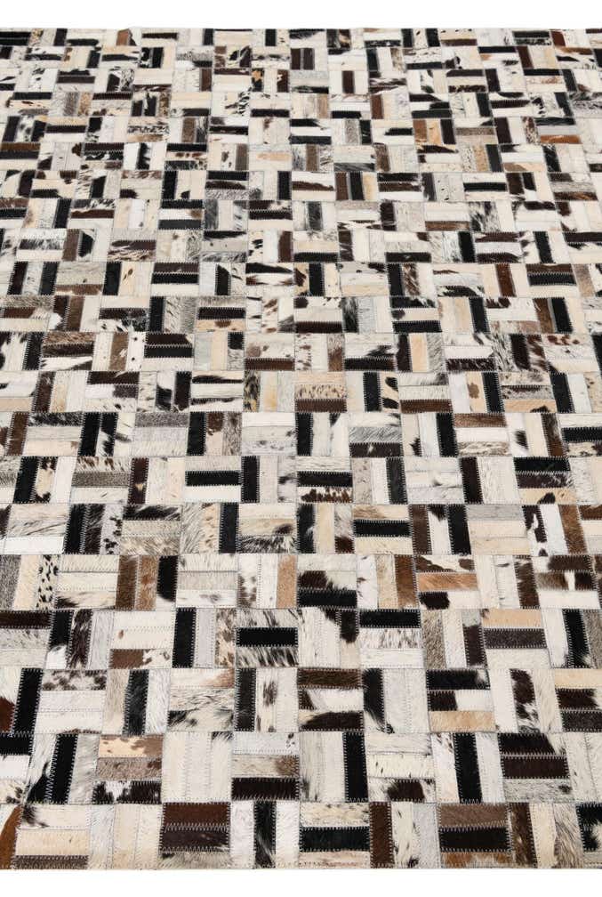 5' 2 x 7' 10 Cowhide Leather Rug