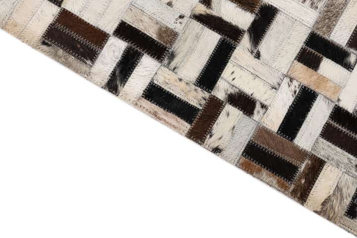 5' 2 x 7' 10 Cowhide Leather Rug