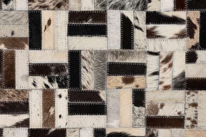 5' 2 x 7' 10 Cowhide Leather Rug