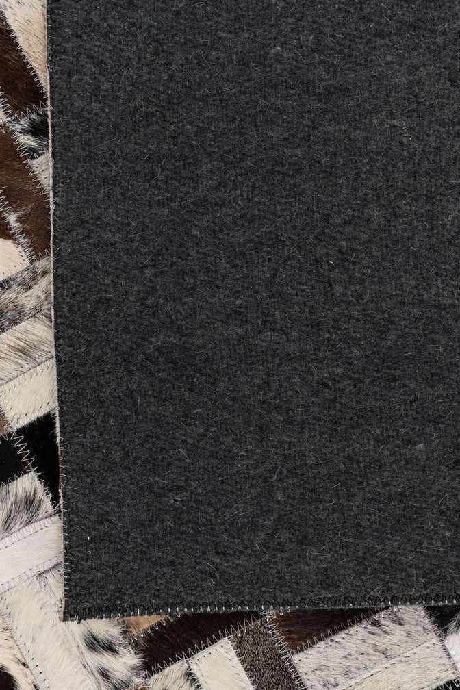 5' 2 x 7' 10 Cowhide Leather Rug