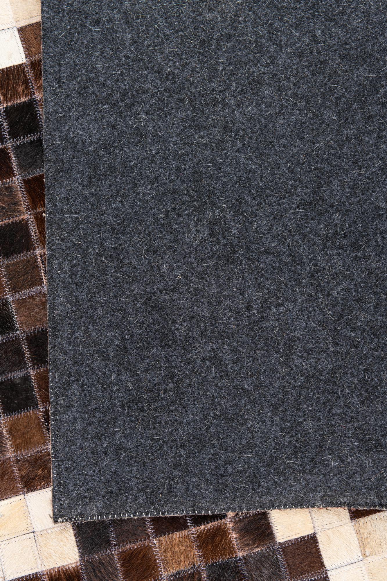 5' 2 x 8' 2 Cowhide Leather Rug