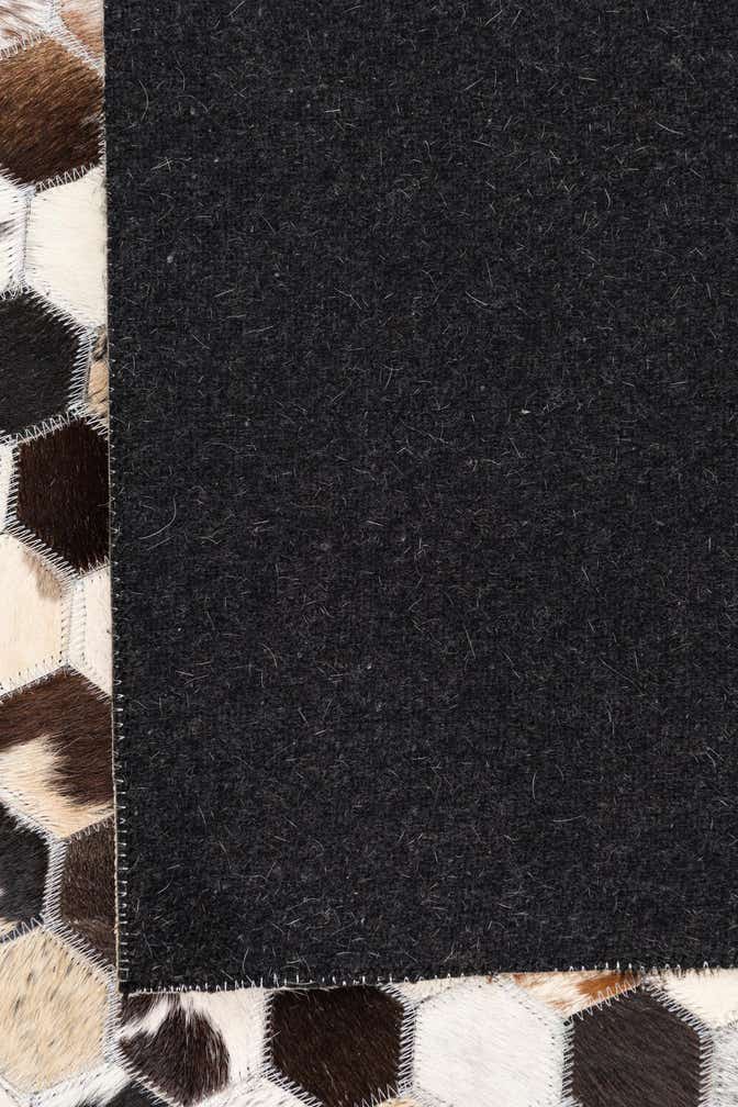 5' x 7' 9 Cowhide Leather Rug