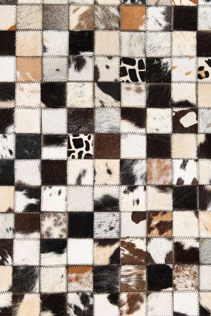 5' 1 x 8' 1 Cowhide Leather Rug
