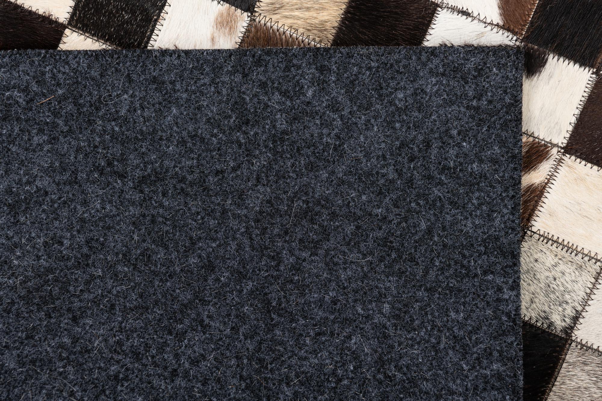 5' 1 x 8' 2 Cowhide Leather Rug