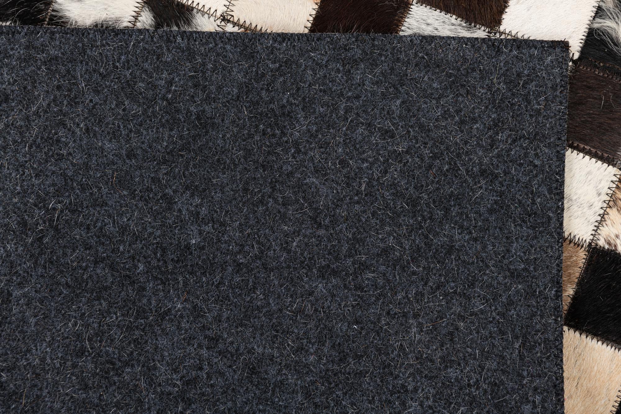 5' 1 x 8' Cowhide Leather Rug