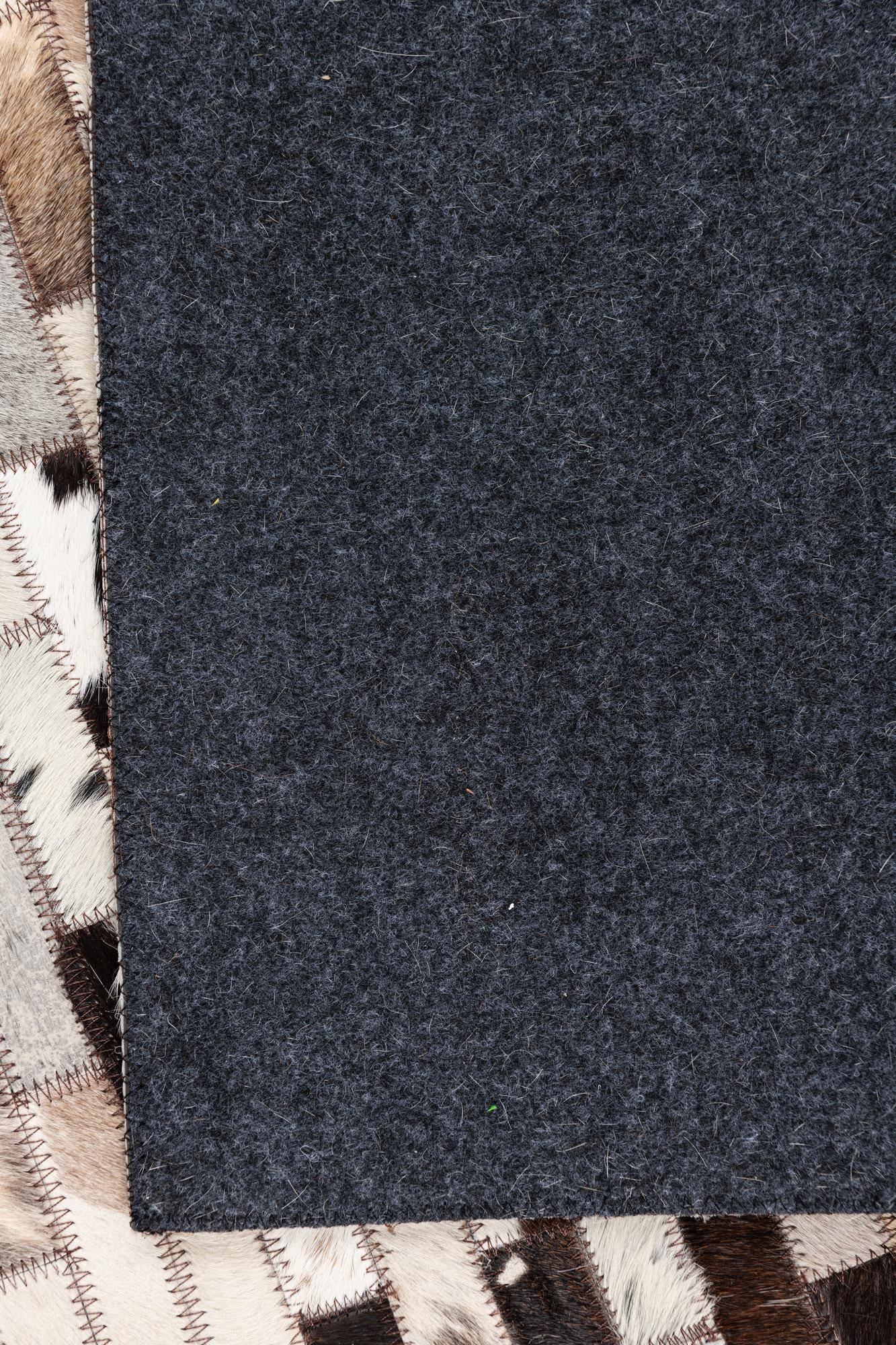 5' 3 x 8' Cowhide Leather Rug