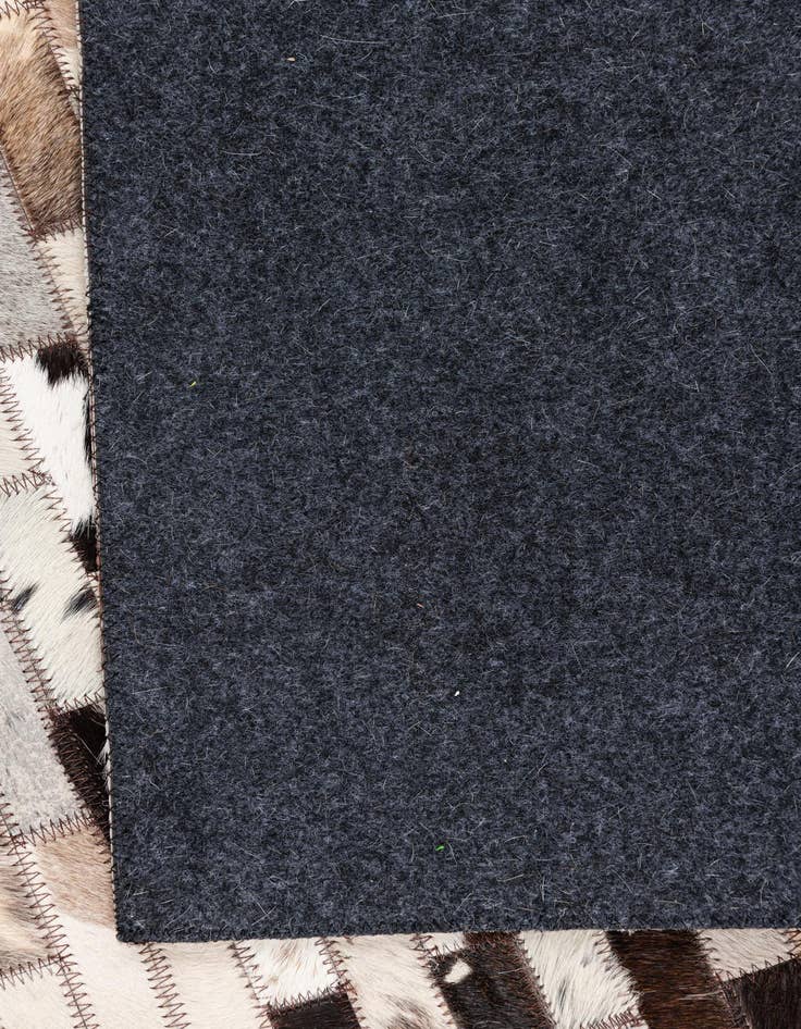 Detail image of 5' 3 x 8' Cowhide Leather Rug