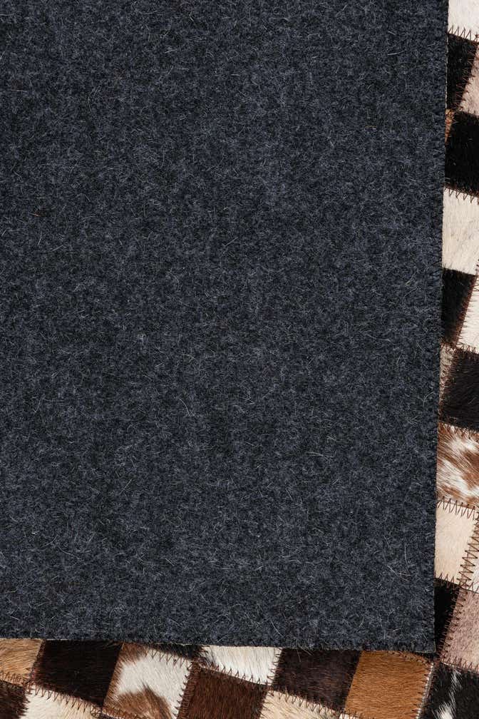 5' 1 x 8' 1 Cowhide Leather Rug