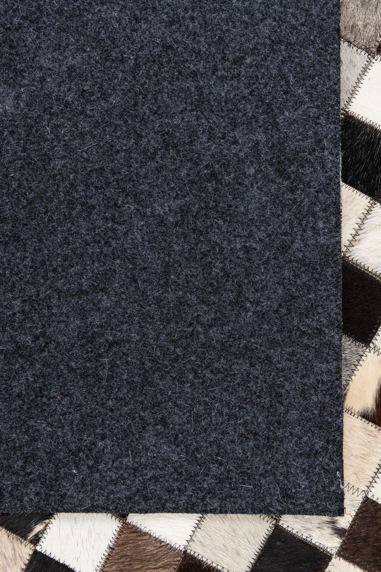 5' 1 x 8' 1 Cowhide Leather Rug