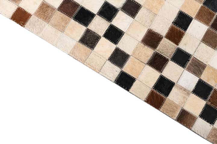 5' 2 x 8' 1 Cowhide Leather Rug
