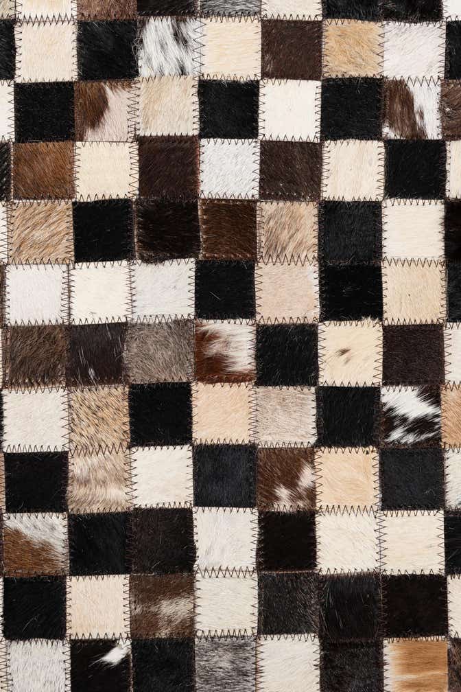 5' 1 x 8' 1 Cowhide Leather Rug
