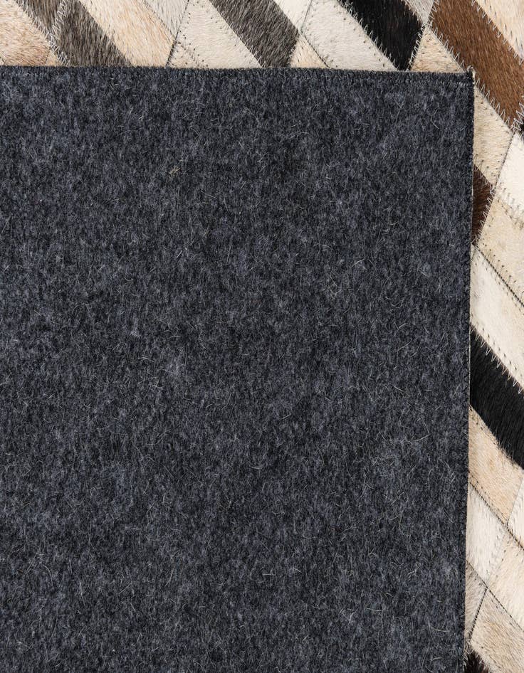 Detail image of 5' x 7' 10 Cowhide Leather Rug