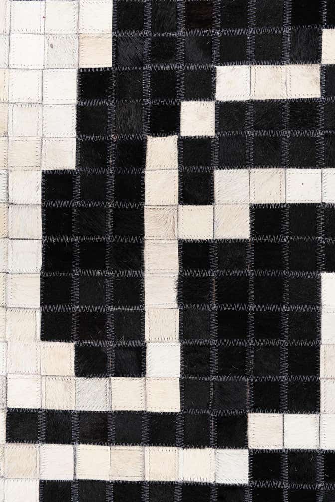 5' 2 x 8' 2 Cowhide Leather Rug