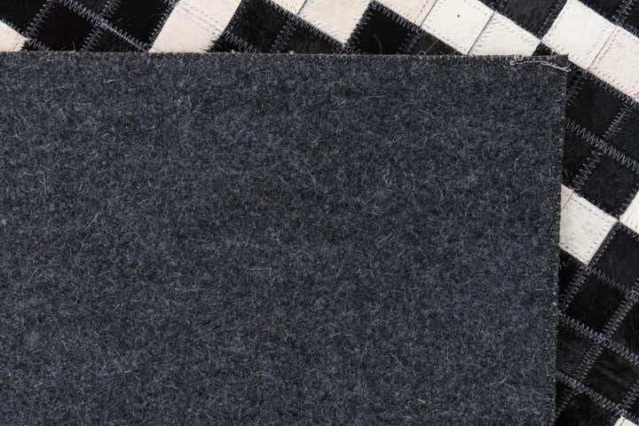 5' 2 x 8' 2 Cowhide Leather Rug
