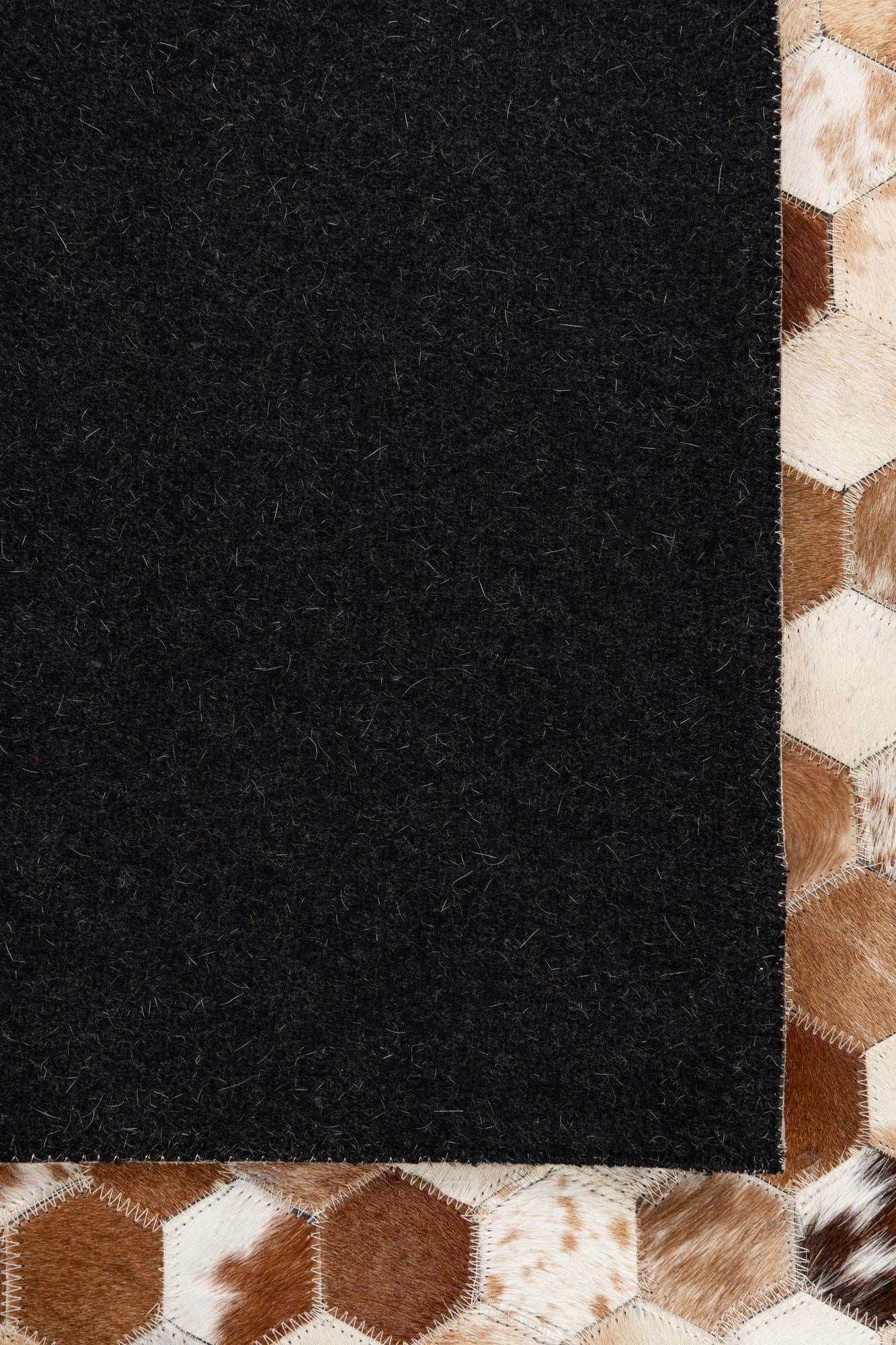 5' 2 x 8' 1 Cowhide Leather Rug